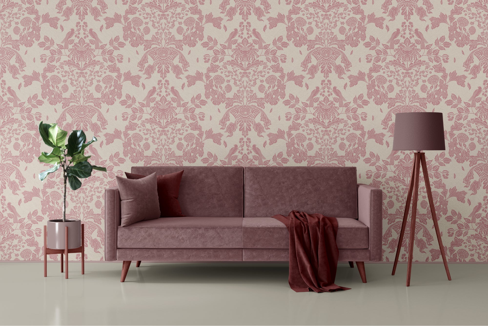 Pink floral traditional wallpaper with a pink sofa, lamp, and plant in a room.