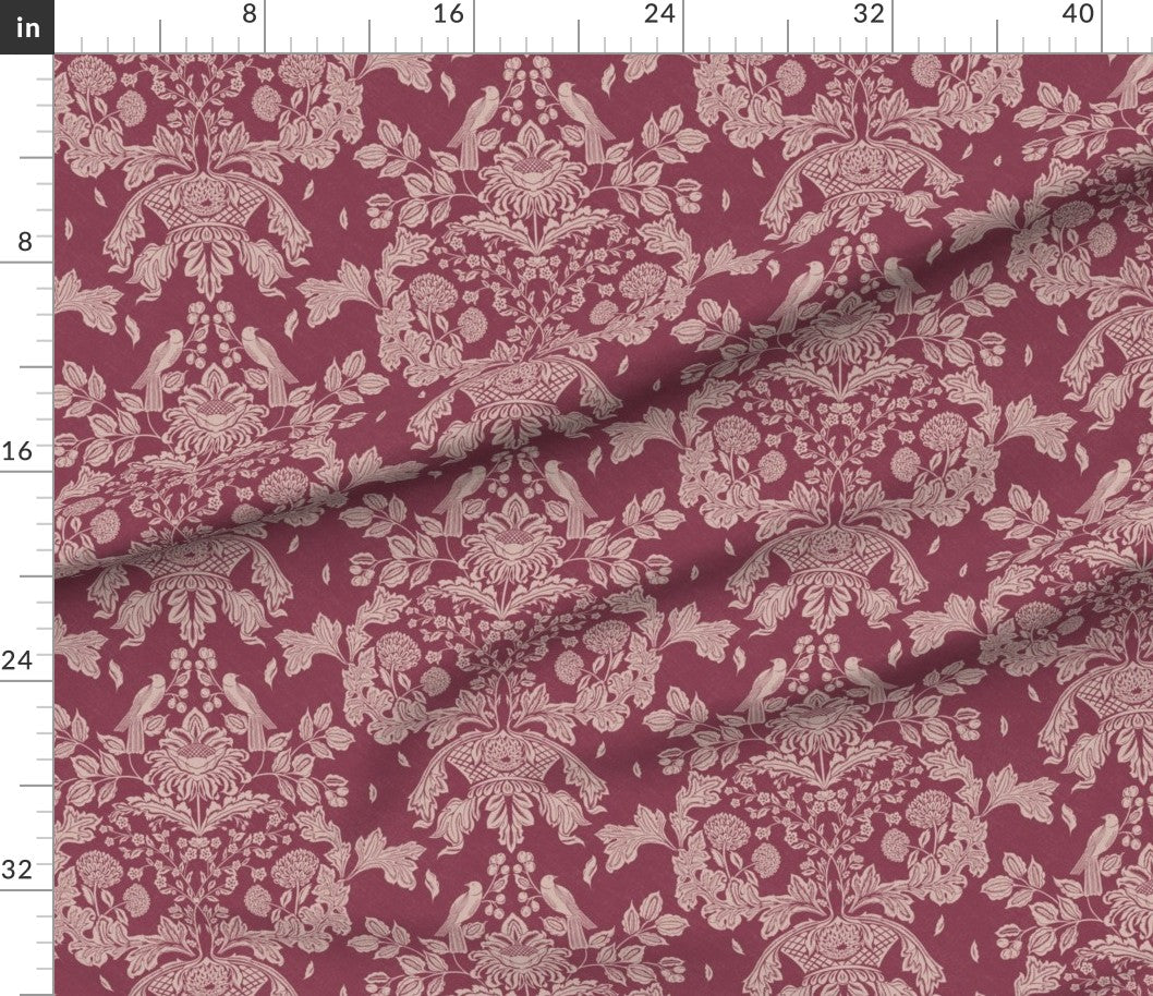 Fabric with a floral and birds vintage pattern on a red background, measured in inches.